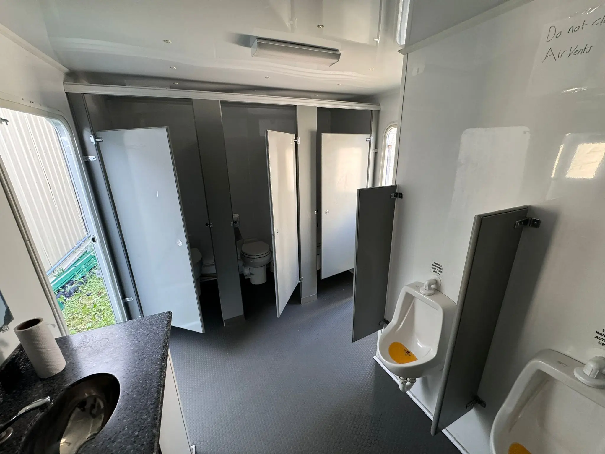 Luxury restroom trailer interior sink and mirror area